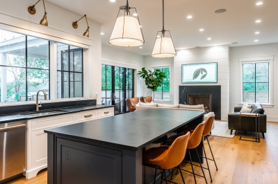 Designs by Santy :: Coastal Farmhouse Kitchens with island, window grills. and view to great room