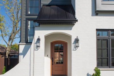 Designs by Santy :: Black and White House Front entry with white brick and metal roof