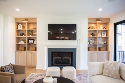 Designs by Santy :: Black and White House Great room with gas fireplace and millwork