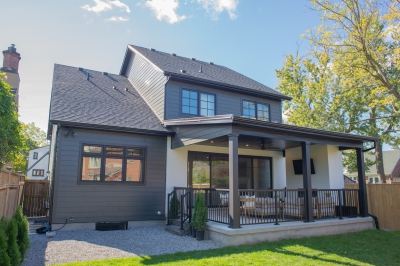 Designs by Santy :: Black and White House Rear exterior with siding and covered porch