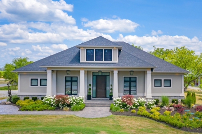 Designs by Santy :: Rural Symmetry Front exterior with tapered columns, dormer and stucco