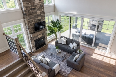 Designs by Santy :: Timber Estate Great room view from above with fireplace