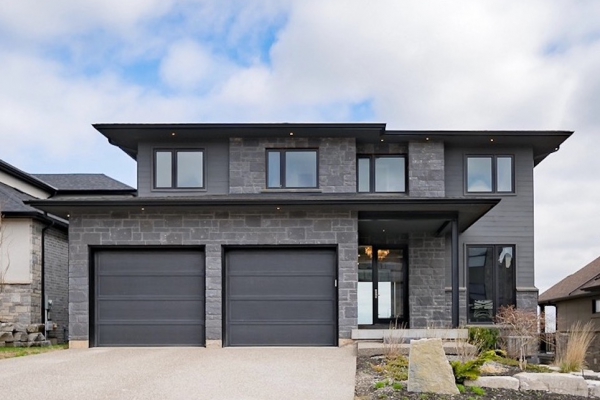 Designs by Santy :: Modern Texture House Contemporary front elevation with stone and siding