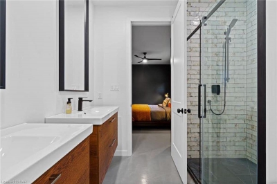 Designs by Santy :: Post House Modern ensuite with glass shower, tile and double vanity