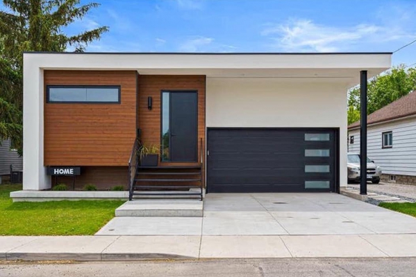 Designs by Santy :: Post House Modern front exterior with stucco and wood siding