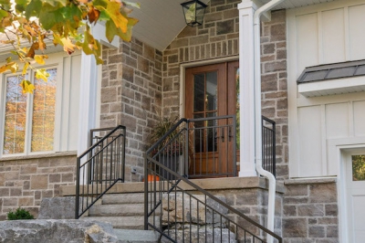 Designs by Santy :: Hilltop Farmhouse Front entry with stone and  board and batten