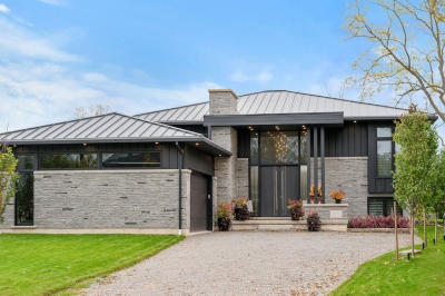 Designs by Santy :: Elevated Bungalow Transitional modern front exterior with stone and vertical siding