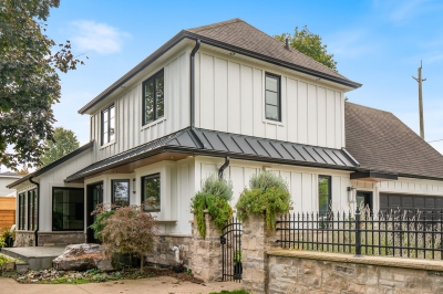 Designs by Santy :: Upscale Craftsman Transformation Craftsman exterior with board and batten and stone