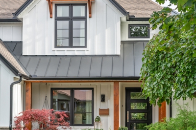 Designs by Santy :: Upscale Craftsman Transformation Craftsman exterior with board and batten, metal roof, stone, and wood accents