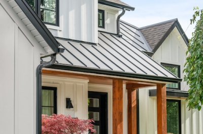 Designs by Santy :: Upscale Craftsman Transformation Craftsman exterior with board and batten, metal roof, stone, and wood accents