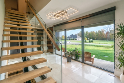 Designs by Santy :: Modern Luxury Contemporary foyer with tile, floating staircase and glass rail