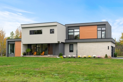 Designs by Santy :: Modern Luxury Modern front exterior with stucco and wood siding and stone