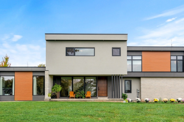 Designs by Santy :: Modern Luxury Modern front exterior with stucco and wood siding and stone