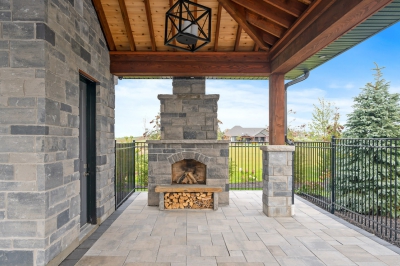 Designs by Santy :: Grand Estate Pool house with rafters and wood-burning fireplace