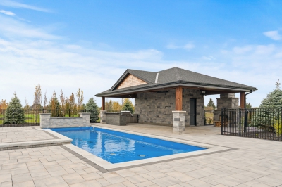 Designs by Santy :: Grand Estate Pool house with stone, wood posts and fireplace