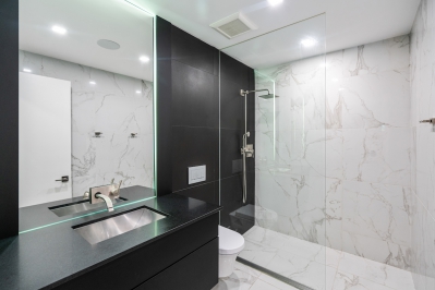 Designs by Santy :: The Painting House Contemporary bathroom with glass shower and floating toilet