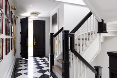 Designs by Santy :: The Checker House Foyer with staircase and brass hardware