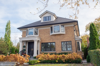 Designs by Santy :: The Checker House Front exterior with brick, stucco and bay windows