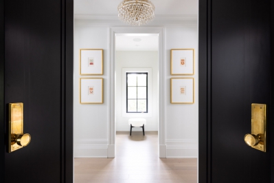 Designs by Santy :: The Checker House Hallway with black doors and brass hardware