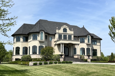 Designs by Santy :: Royal Estate Front exterior with stucco, stone, turret roofs, balcony and wrought iron rails