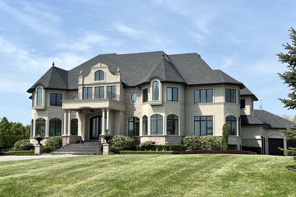 Designs by Santy :: Royal Estate Front exterior with stucco, stone, turret roofs, balcony and wrought iron rails