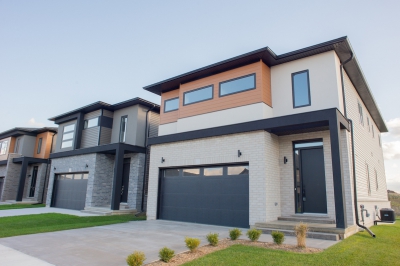 Designs by Santy :: Outline Houses Contemporary front elevation with stucco, siding and brick