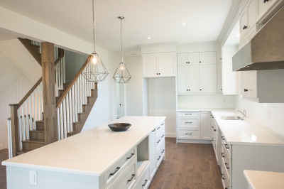 Designs by Santy :: Modern Farmhouse Kitchen with island, chandelier and millwork