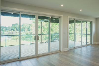 Designs by Santy :: Modern Lines great room with patio doors and rear porch