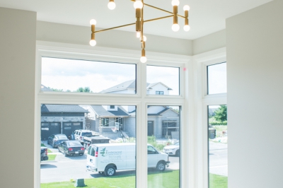 Designs by Santy :: Modern Lines Modern dining with tall windows and chandelier