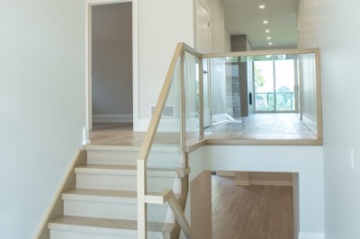 Designs by Santy :: Modern Lines Front foyer with staircase and glass rail