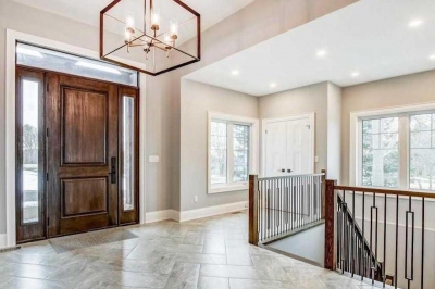 Designs by Santy :: Timber Entry Foyer with chandelier and staircase