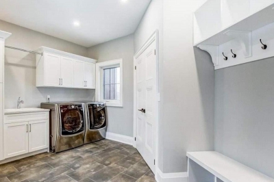 Designs by Santy :: Timber Entry Mudroom with laundry and millwork